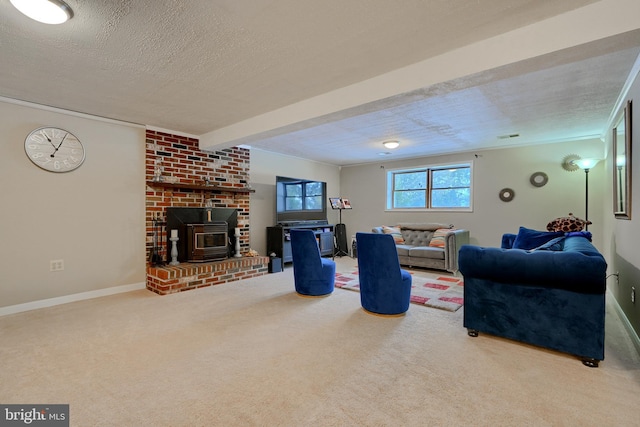 living room with carpet, a wood stove, and a textured ceiling