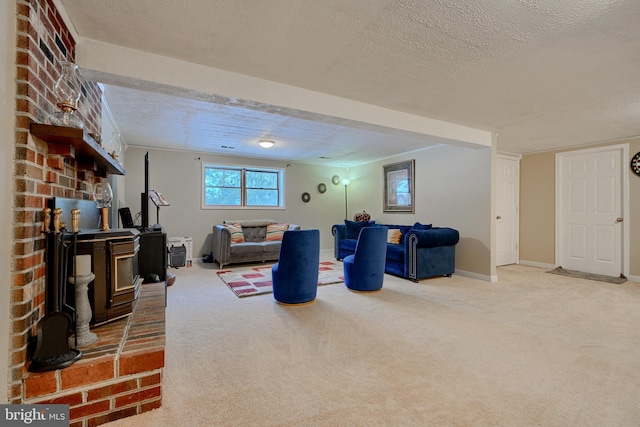 living room with a textured ceiling and carpet flooring