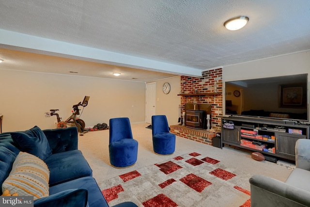 living room with a wood stove, a textured ceiling, beamed ceiling, and carpet flooring