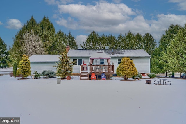 view of front of house featuring a deck and a gazebo