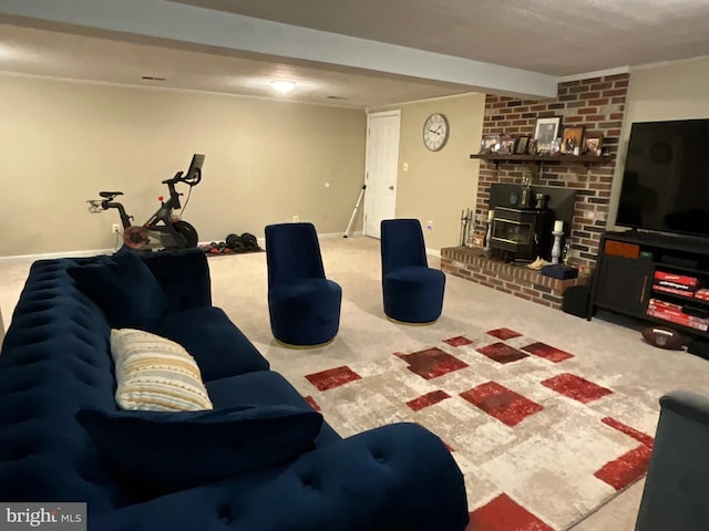 carpeted living room with a wood stove and beam ceiling