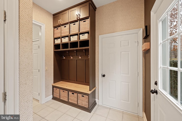 mudroom with light tile patterned floors