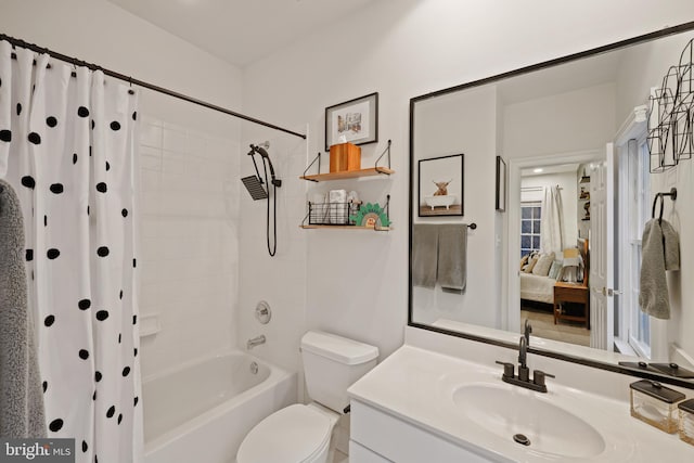 full bathroom with vanity, toilet, and shower / bath combo