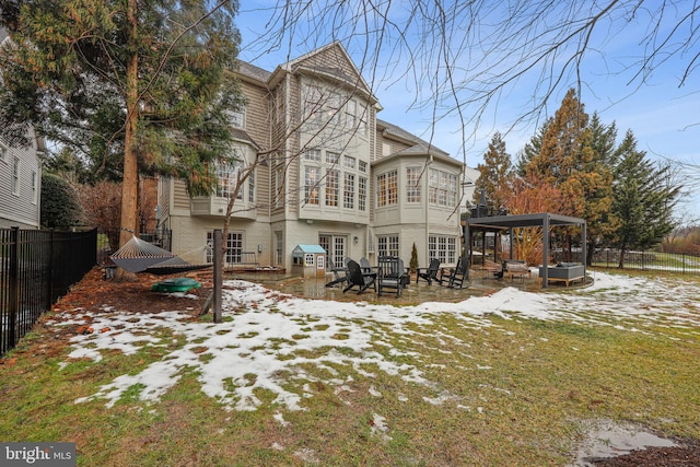 snow covered property featuring a lawn and french doors