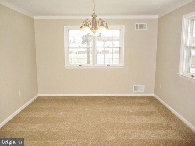 unfurnished room featuring crown molding, carpet, and an inviting chandelier