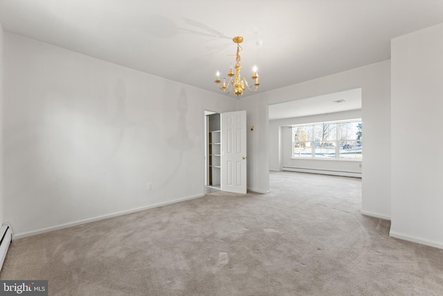 unfurnished room with baseboard heating, a notable chandelier, and light colored carpet