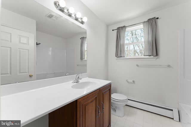 bathroom with toilet, a shower, vanity, and baseboard heating