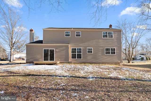 view of snow covered house