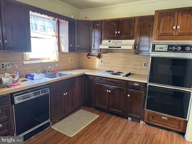 kitchen featuring decorative backsplash, double wall oven, sink, black dishwasher, and white electric stovetop