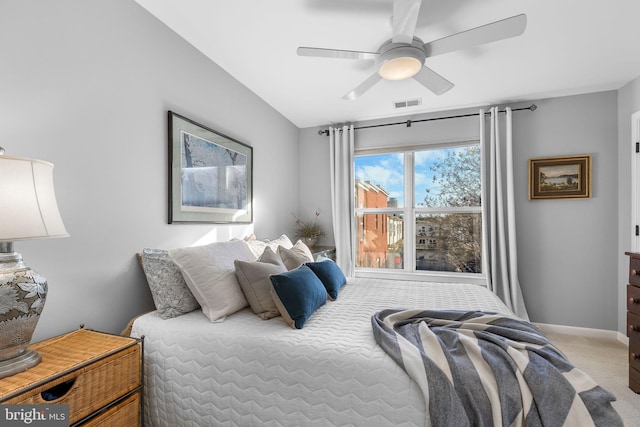 carpeted bedroom featuring ceiling fan