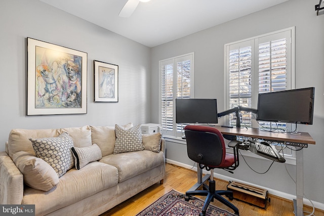 office space with light hardwood / wood-style flooring