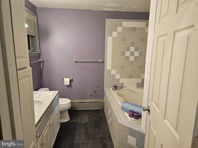 bathroom featuring a relaxing tiled tub, vanity, toilet, and a baseboard heating unit