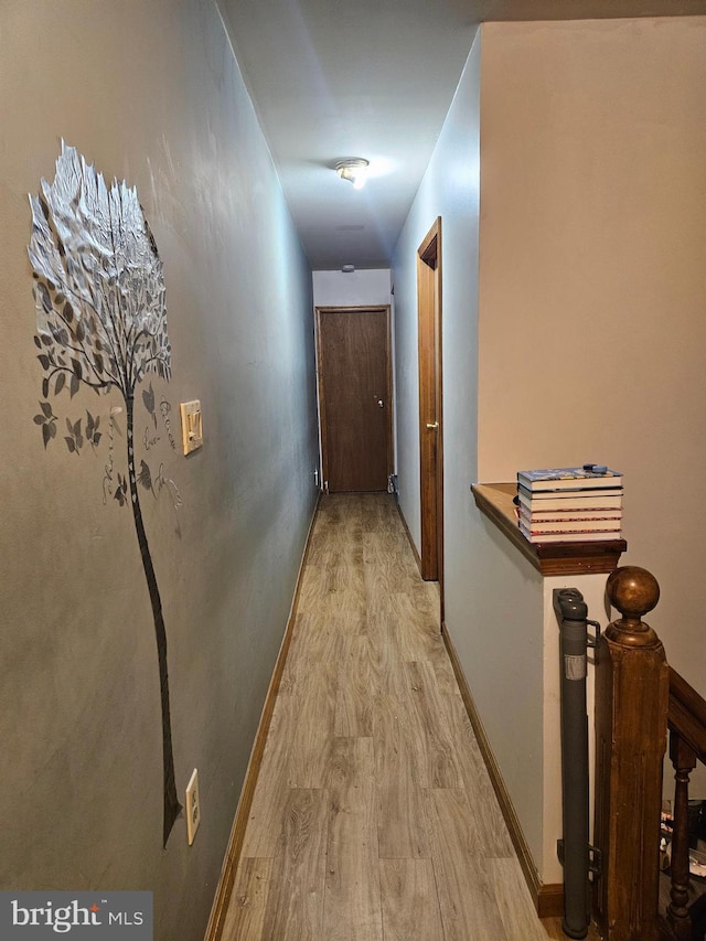 corridor featuring light wood-type flooring