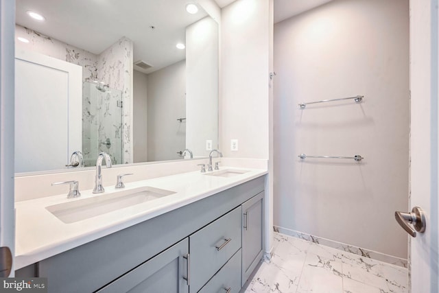 bathroom featuring vanity and walk in shower