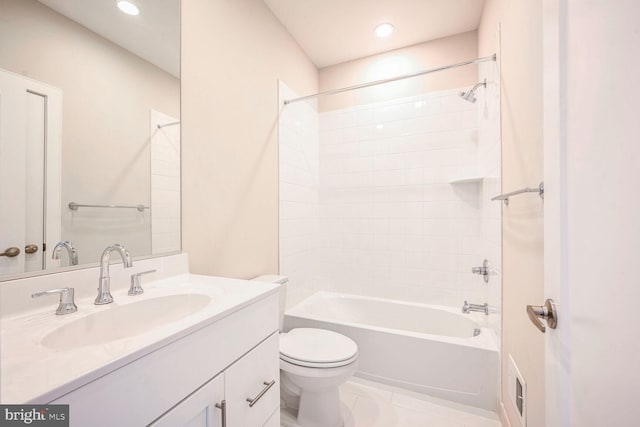 full bathroom featuring toilet, vanity, tile patterned floors, and  shower combination