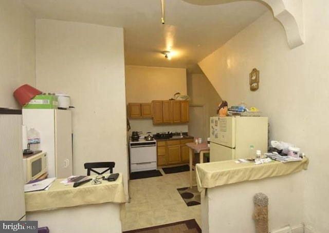 kitchen featuring white appliances