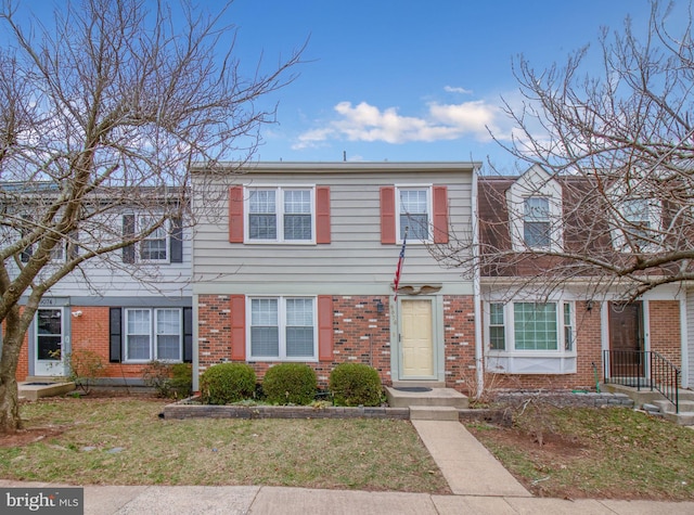 multi unit property with brick siding