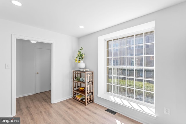 interior space with plenty of natural light and light wood-type flooring