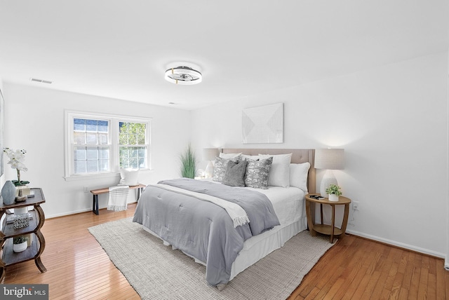 bedroom with light wood-type flooring