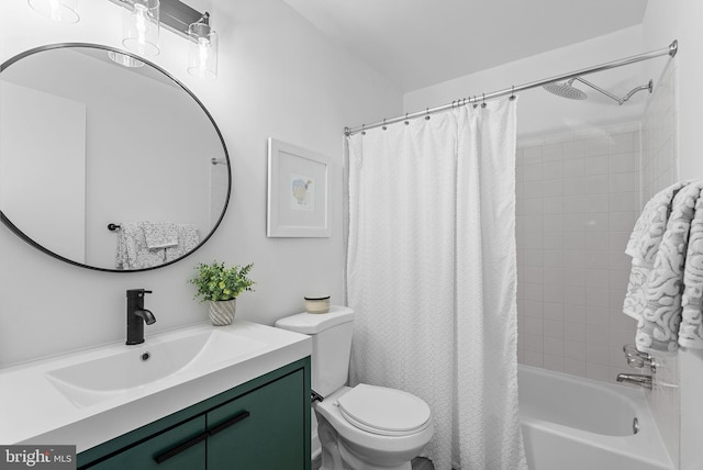 full bathroom featuring vanity, shower / bath combo, and toilet