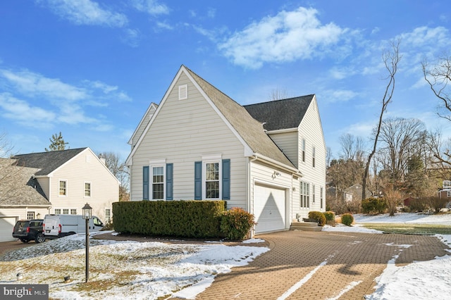 view of front of property with a garage