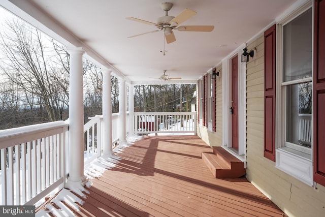 deck featuring ceiling fan and covered porch