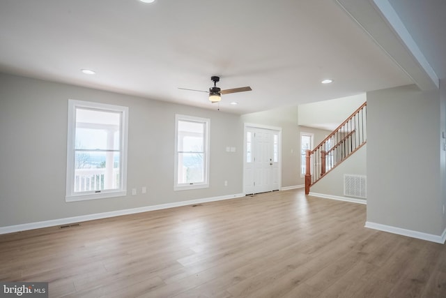 interior space featuring ceiling fan and light hardwood / wood-style floors