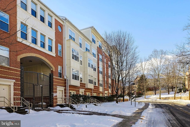 view of snow covered property