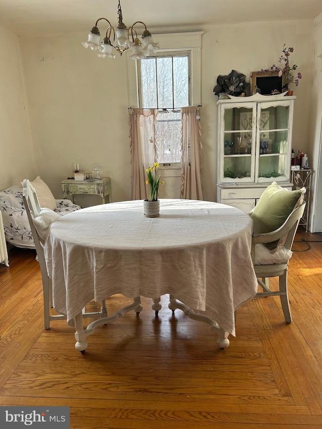 dining room featuring a notable chandelier