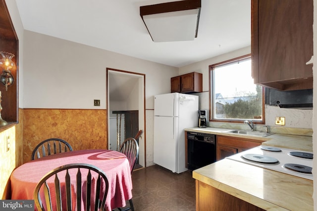 kitchen with sink and white appliances