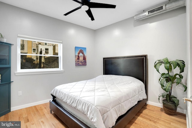 bedroom featuring ceiling fan and light wood-type flooring