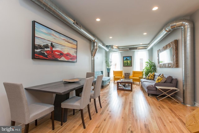 dining space featuring light hardwood / wood-style floors