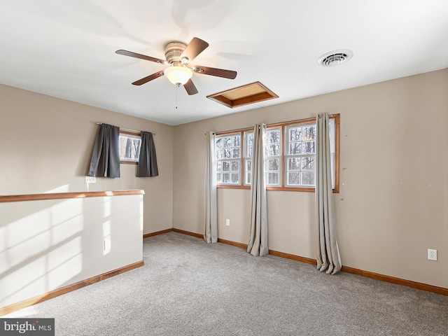 carpeted empty room with ceiling fan