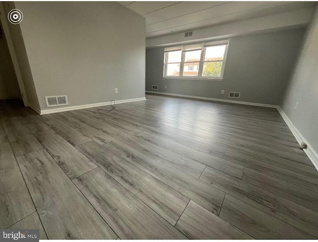 spare room featuring hardwood / wood-style flooring