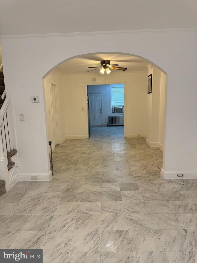 hallway featuring radiator heating unit and ornamental molding