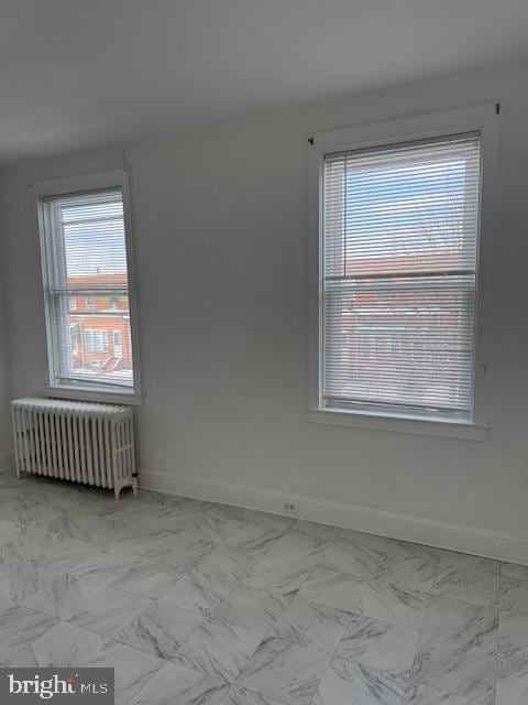 spare room with radiator