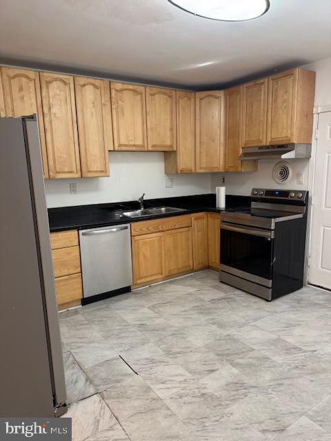 kitchen featuring sink and stainless steel appliances