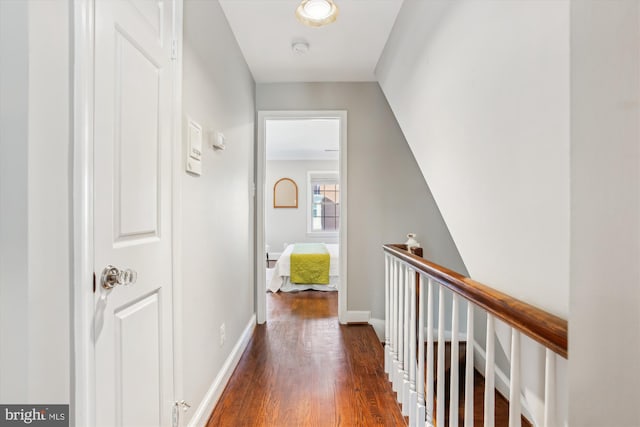 hallway featuring dark hardwood / wood-style flooring