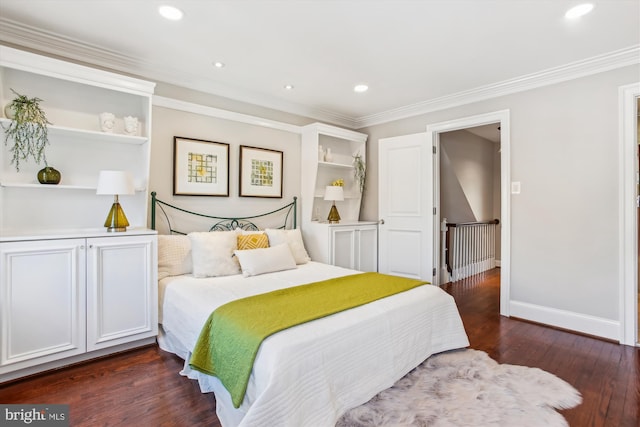 bedroom with dark wood-type flooring and ornamental molding