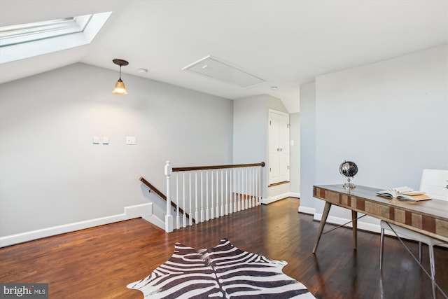 hall featuring vaulted ceiling and dark wood-type flooring