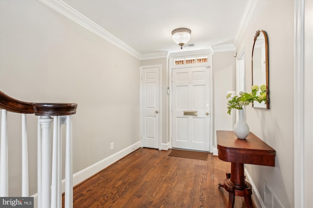 foyer with crown molding and dark hardwood / wood-style flooring