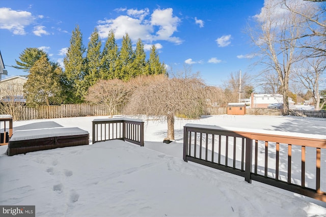 view of snow covered deck