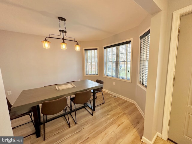 dining room featuring light hardwood / wood-style floors