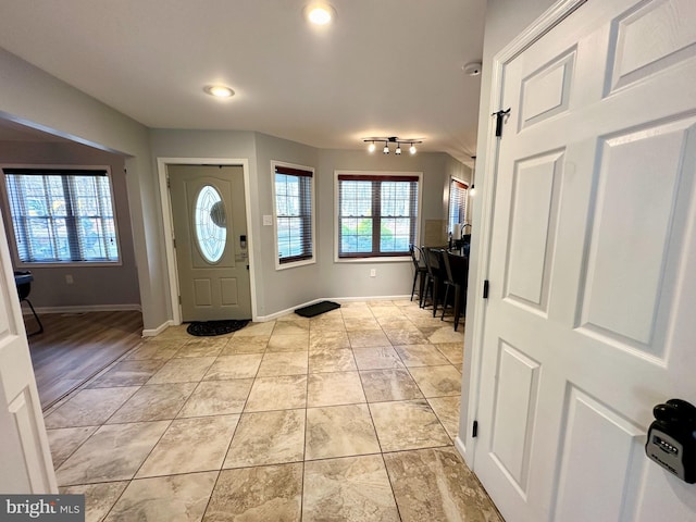 foyer entrance featuring light tile patterned floors