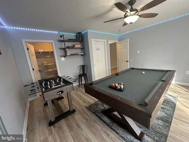 game room featuring light hardwood / wood-style flooring, ceiling fan, and billiards