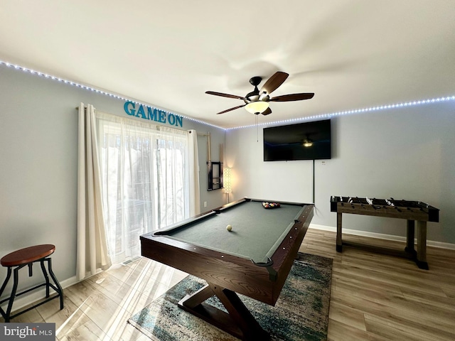 recreation room featuring ceiling fan, wood-type flooring, and billiards