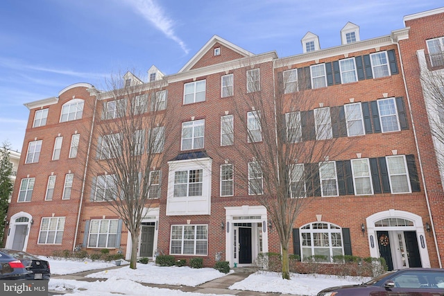 view of snow covered building