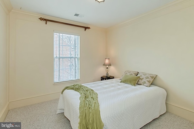 bedroom featuring light carpet and crown molding