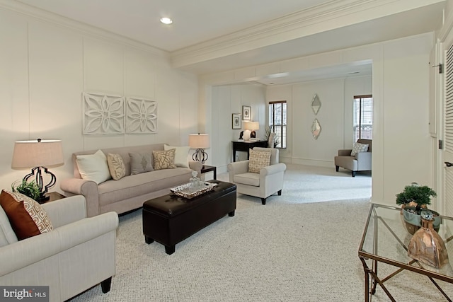 living room with light colored carpet and crown molding