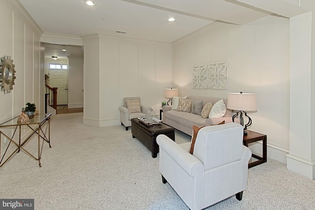 living room with light colored carpet and crown molding